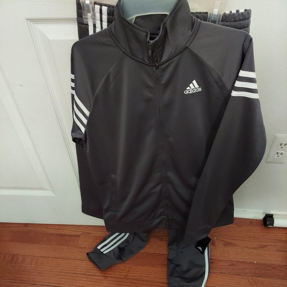Young men Adidas Track suit